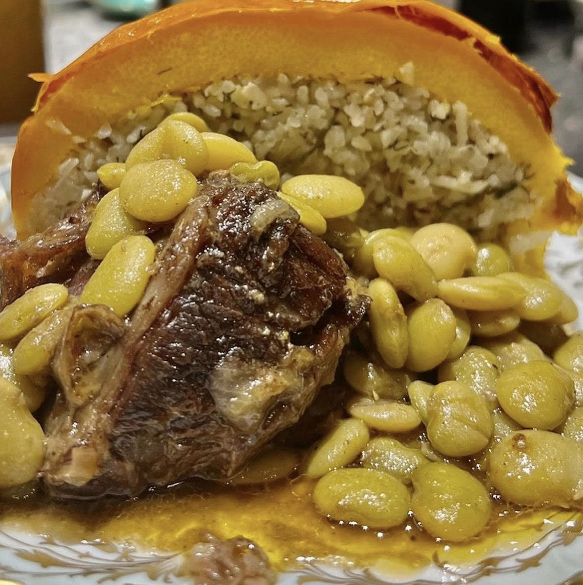 Braised lamb shank with herbed rice and lima beans