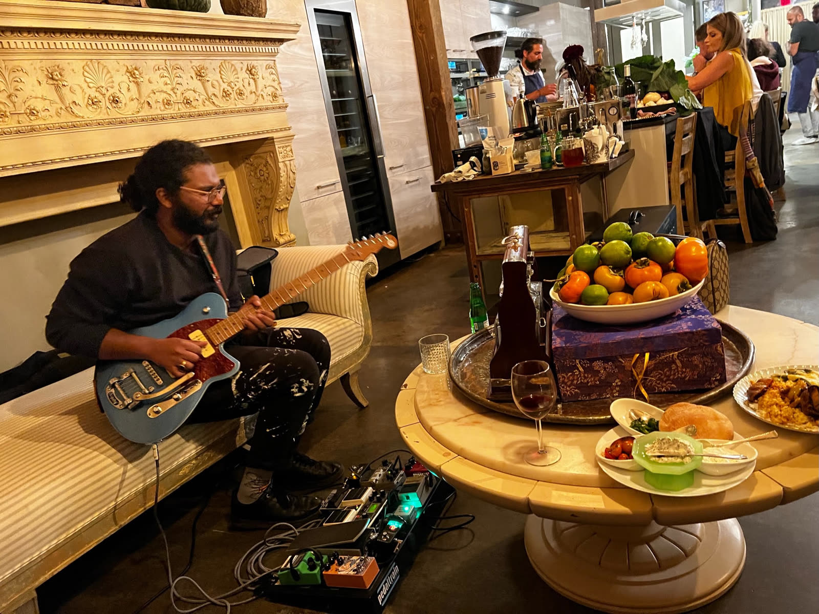 Live guitarist performing during a private event