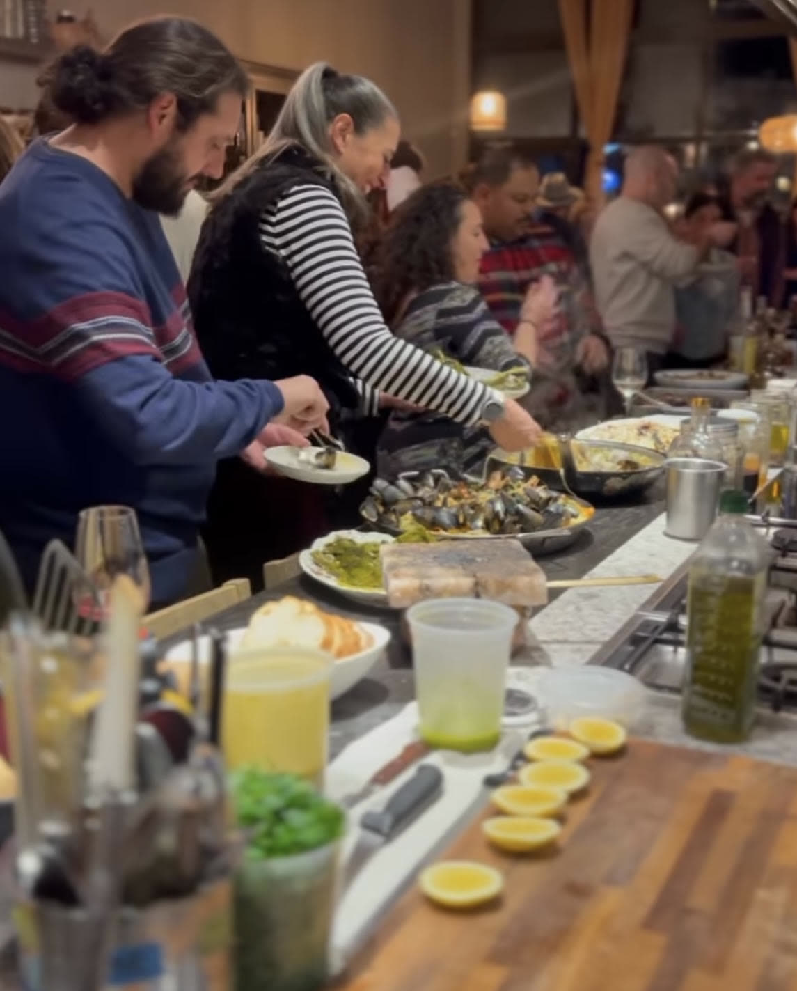 Guests serving themselves at the private event buffet