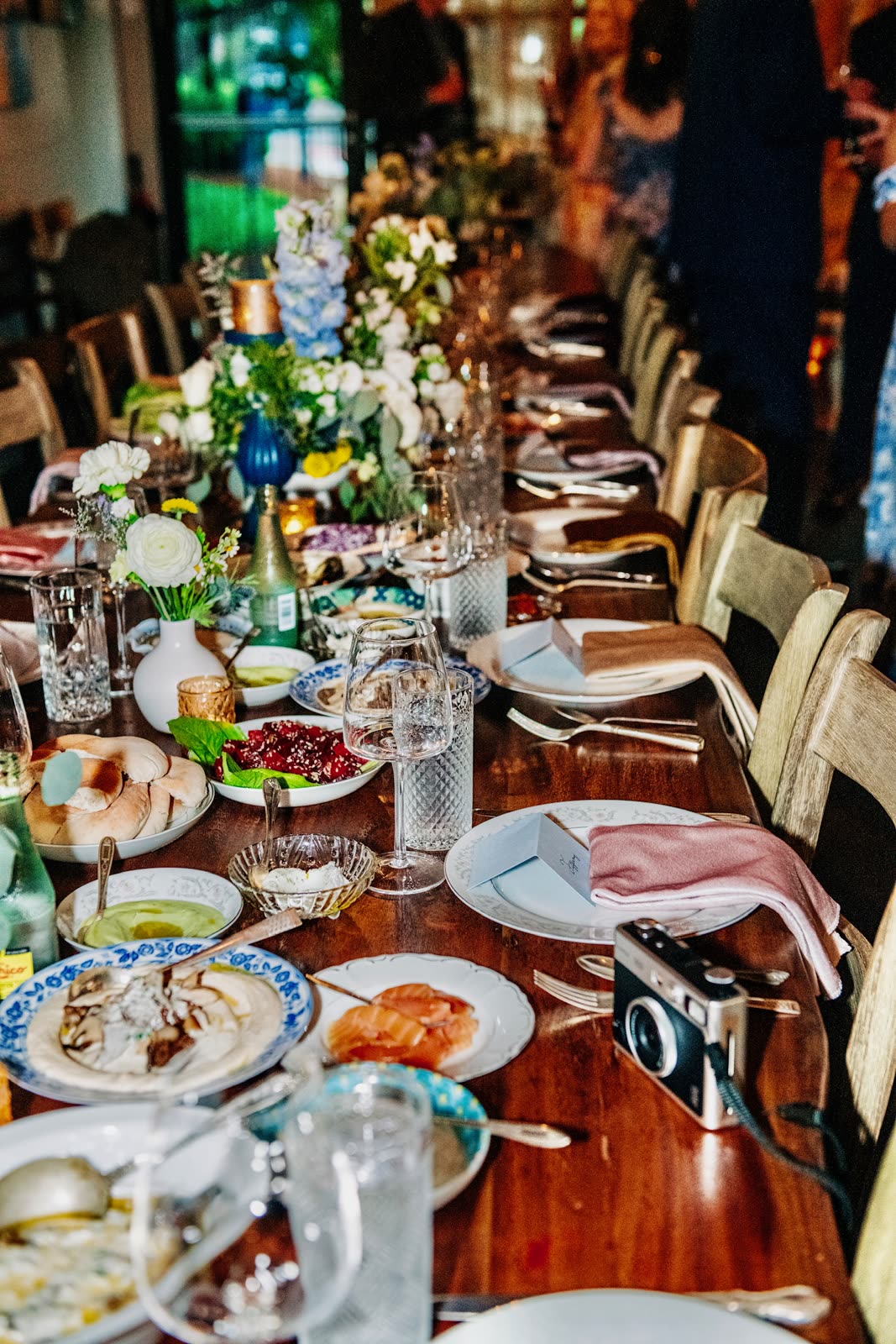 Long communal table set for a private dinner